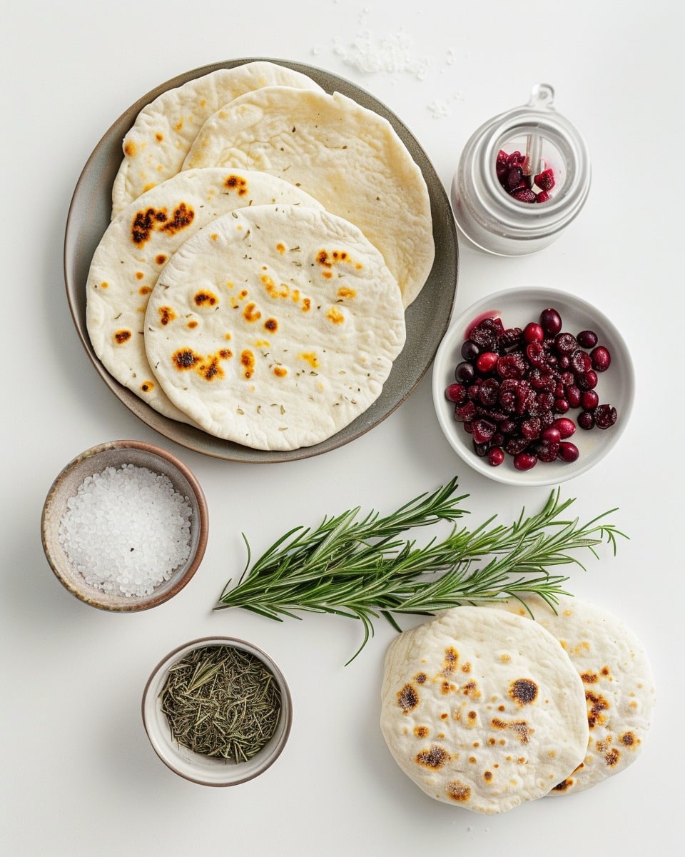 Baked Brie in Bread Bowl with Cranberry Sauce and Thyme