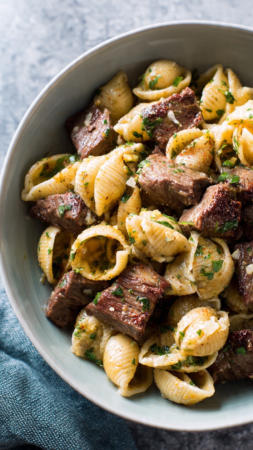Steak Bites and Shell Pasta in Garlic Butter Alfredo Sauce