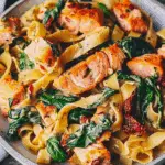 Salmon Pasta with Sun-Dried Tomato Cream Sauce and Spinach