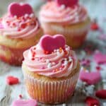 Love Cupcakes with Frosting and Heart-Shaped Candies