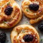 Brie and Blackberry Puff Pastry Swirls with Honey & Rosemary