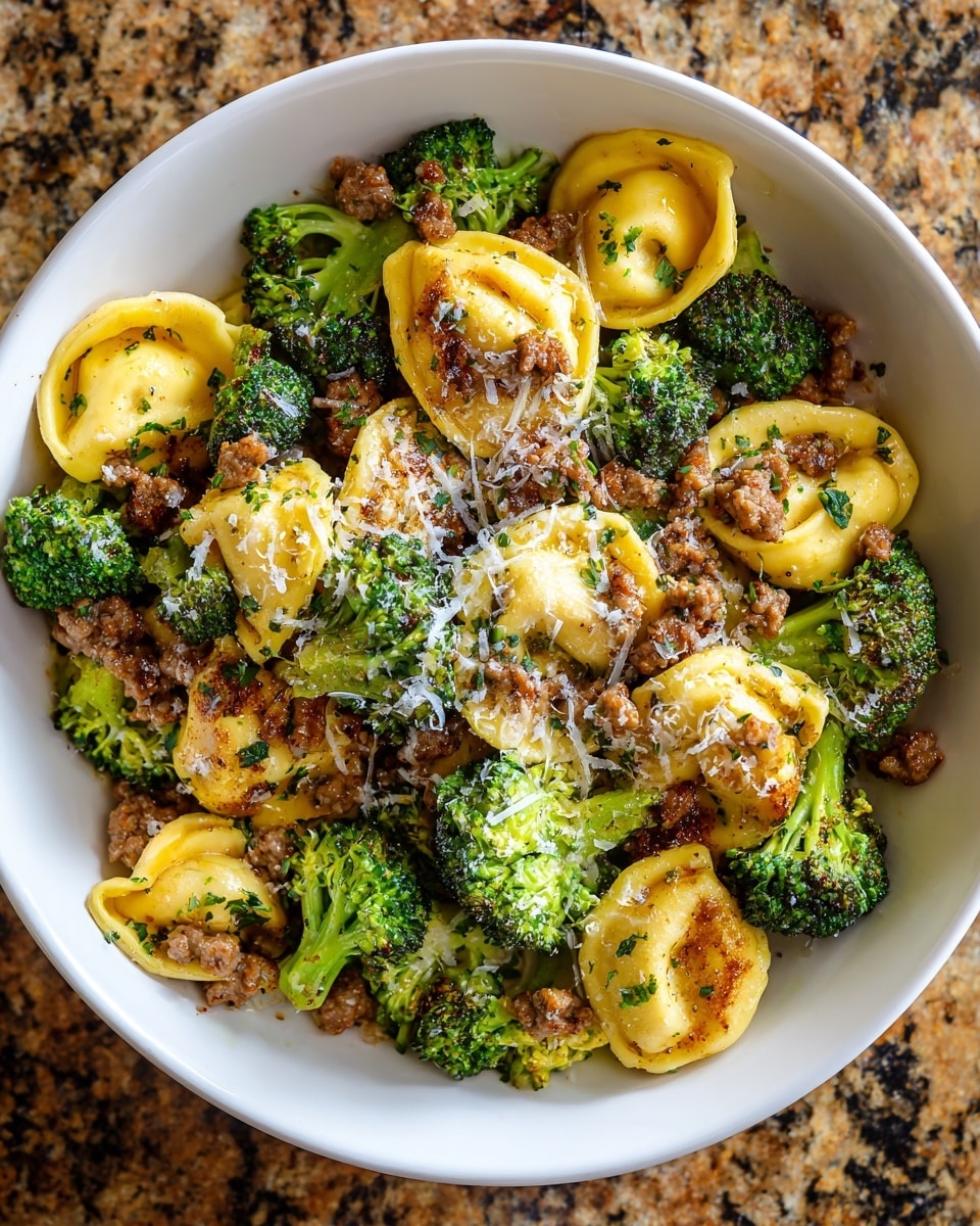 The image shows a shiny silver pan filled with a creamy shrimp dish topped with melted golden and white cheese. There are multiple layers visible: a bottom layer of creamy white sauce mixed with small bits of green herbs, scattered plump shrimp with a pinkish-orange color, and a top layer of melted cheese that is slightly browned in spots. Some green leafy herbs are mixed inside the dish, adding a fresh look. The pan rests on a white marbled surface next to a wooden spoon and a striped cloth, with some green herbs and a small white bowl of sauce in the background. photo taken with an iphone --ar 4:5 --v 7
