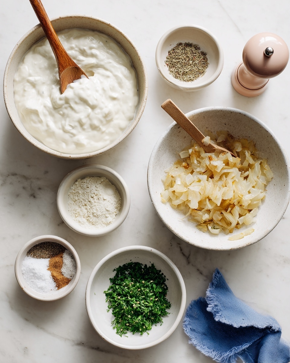 The image shows a top view of a white marbled surface with several small white bowls arranged neatly. The largest bowl holds a thick, creamy white sauce with a wooden spoon resting inside. To the right, a medium white bowl contains golden brown cooked onions with a small wooden spoon partially buried in them. Below, there is a white bowl with finely chopped green herbs. Two smaller white bowls include one with a fine white powder and another with a mix of ground spices. A pale pink pepper mill and a blue cloth are also visible on the surface. photo taken with an iphone --ar 4:5 --v 7