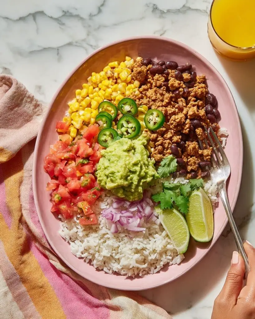 Loaded Burrito Bowl with Cilantro Lime Rice, Black Beans, Tofu Sofritas, Fajita Veggies, and Fresh Toppings Recipe