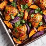 Harissa Lemon Chicken Thighs with Roasted Sweet Potatoes and Onions Recipe