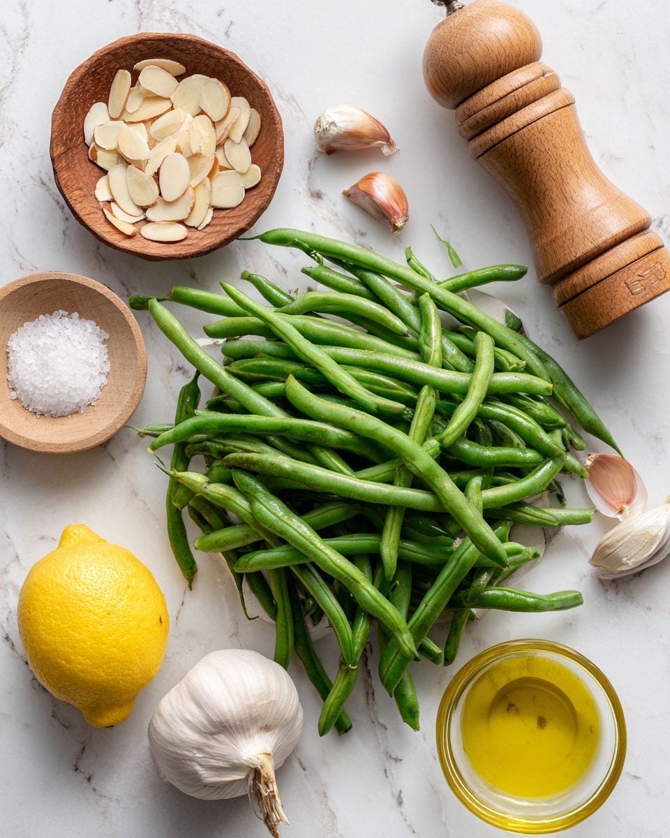 The image shows many fresh green beans piled in the center on a white marbled surface, with a small bowl of sliced almonds in the top left corner, light brown shallot and white garlic bulb placed below the almonds, and a wooden dish filled with salt near the bottom left. A bright yellow lemon and a small glass of light yellow oil sit near the bottom right. A wooden pepper grinder rounds out the arrangement at the top right, all items spaced neatly and evenly across the white marbled background photo taken with an iphone --ar 4:5 --v 7