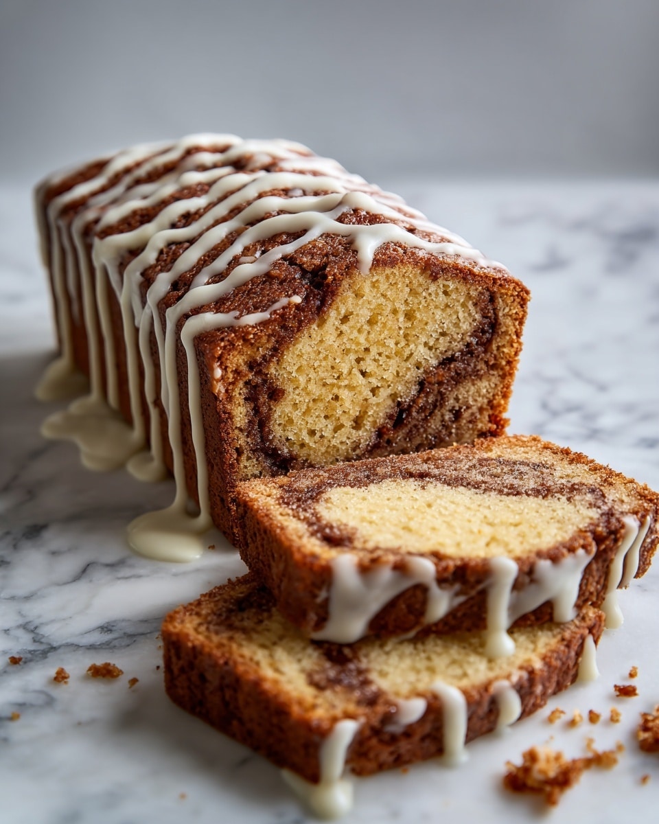 The image shows a rectangular loaf with a dark brown, textured crust, drizzled with a white glaze on top. Two close-up slices lie next to the loaf, revealing a soft, moist inside with a light tan color and dark brown swirls spread unevenly throughout the cake. The slices are stacked slightly on each other with the dripping glaze running along the edges. The whole scene sits on a white marbled surface with some crumbs scattered around. photo taken with an iphone --ar 4:5 --v 7