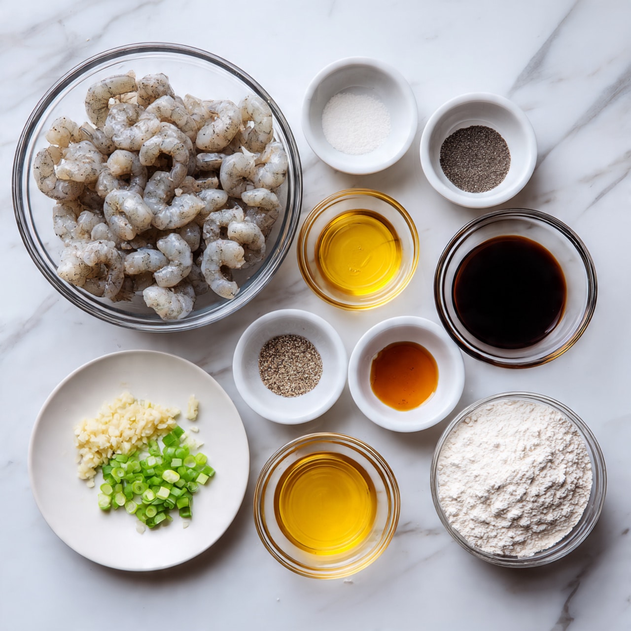 A clear glass bowl filled with raw grayish pieces of meat sits on a white marble surface. Next to it is a white plate with a small heap of light beige minced garlic and a few bright green chopped onion pieces. Surrounding these are several small white bowls containing different liquids and powders: black and white pepper mixed in one, a dark soy-colored thick sauce in another, a light yellow translucent liquid, a thin amber liquid, and white flour in a clear glass bowl. The arrangement is orderly on the white marble background. Photo taken with an iphone --ar 4:5 --v 7