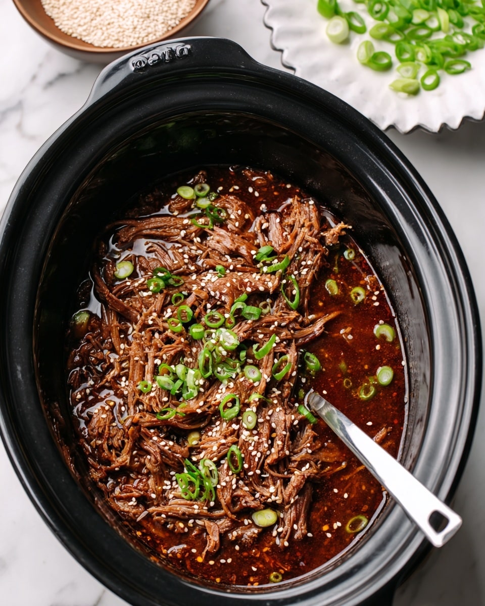 The image shows shredded dark brown meat soaked in rich, glossy brown sauce inside a black slow cooker. Small green slices of green onion and white sesame seeds are scattered over the top, adding light green and white details. A silver spatula rests in the cooker, partially under the meat. Nearby, on a white marbled surface, there are two small white bowls—one filled with white sesame seeds and the other with sliced green onions. The photo taken with an iphone --ar 4:5 --v 7