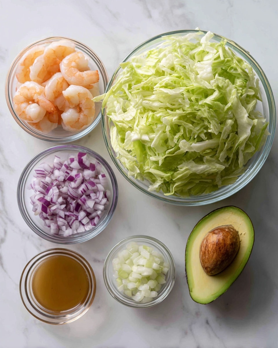 A round clear glass bowl filled with shredded light green lettuce sits on a white marbled surface. To the right, there are five items arranged in a loose square: a small clear glass bowl with light orange shrimp, a small clear glass bowl with chopped purple and white onions, half an avocado with a smooth green inside and the seed in one half, and a small glass container with light brown dressing. The texture of the lettuce looks fresh and crisp, the shrimp are plump with an orange tint, and the avocado appears ripe and creamy. Photo taken with an iphone --ar 4:5 --v 7