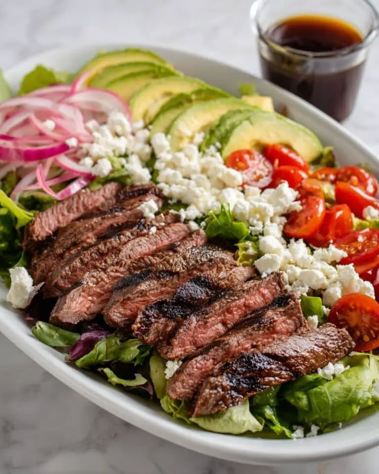 Steak Salad with New York Strip, Cherry Tomatoes, Avocado, Blue Cheese, and Pickled Red Onions Recipe