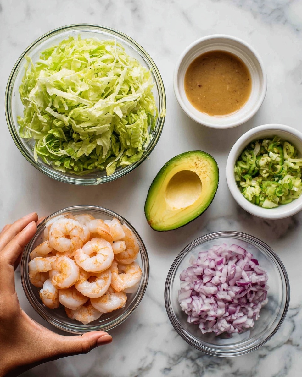 The image shows five clear glass bowls on a white marbled surface. The largest bowl on the left contains shredded green lettuce. Above it to the right is a small bowl with light brown dressing. Next to that is a white bowl holding a halved avocado, with the green flesh and large pit visible. Below the avocado, a small bowl holds finely chopped red onions, with purple and white pieces. At the bottom left is another small bowl filled with peeled, pinkish-orange shrimp. A woman's hand is gently holding the edge of the bowl with shrimp. photo taken with an iphone --ar 4:5 --v 7