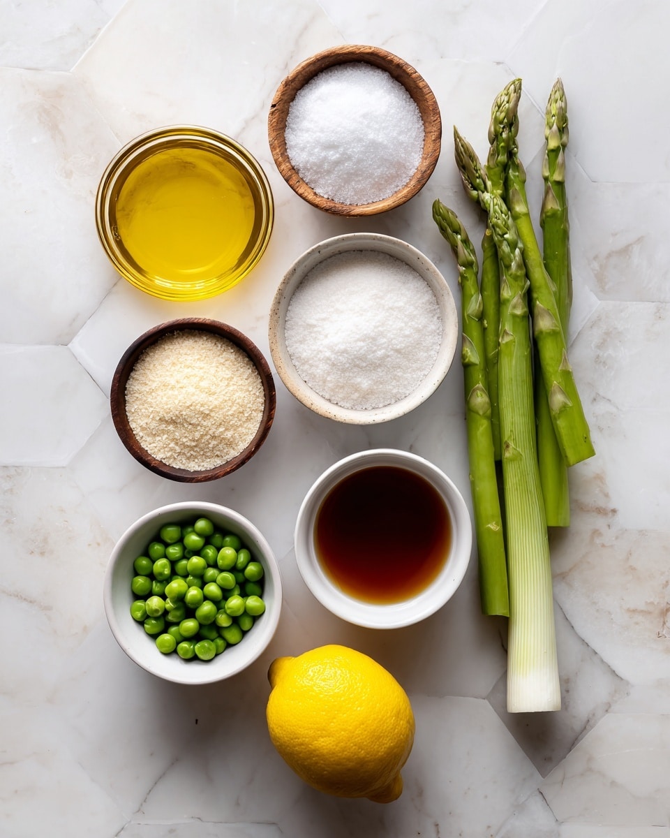 The image shows a top-down view of several ingredients neatly arranged on a white marbled surface. There are eight items in total, placed in a grid-like pattern on a tiled background altered to white marble: a small round bowl of golden yellow oil in the top left, next to that a small round bowl of coarse white salt below it. Below the salt is a small round wooden bowl of creamy light beige powder. Below that is another small round white bowl filled with small green peas. At the bottom center, there is a bright yellow lemon placed directly on the surface. To the right of the peas is a small white bowl with a dark amber liquid, likely broth or sauce. To the right of the lemon is a long, green leek with white base and dark green stalks placed vertically. In the center of the image are five green asparagus spears laid out. The entire setting is simple and clean. photo taken with an iphone --ar 4:5 --v 7