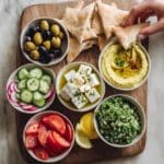 Mezze Platter with Mediterranean Dips, Cheeses, and Fresh Veggies Recipe