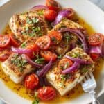 Mediterranean Baked Fish with Cherry Tomatoes, Dill, and Lemon Emulsion Recipe