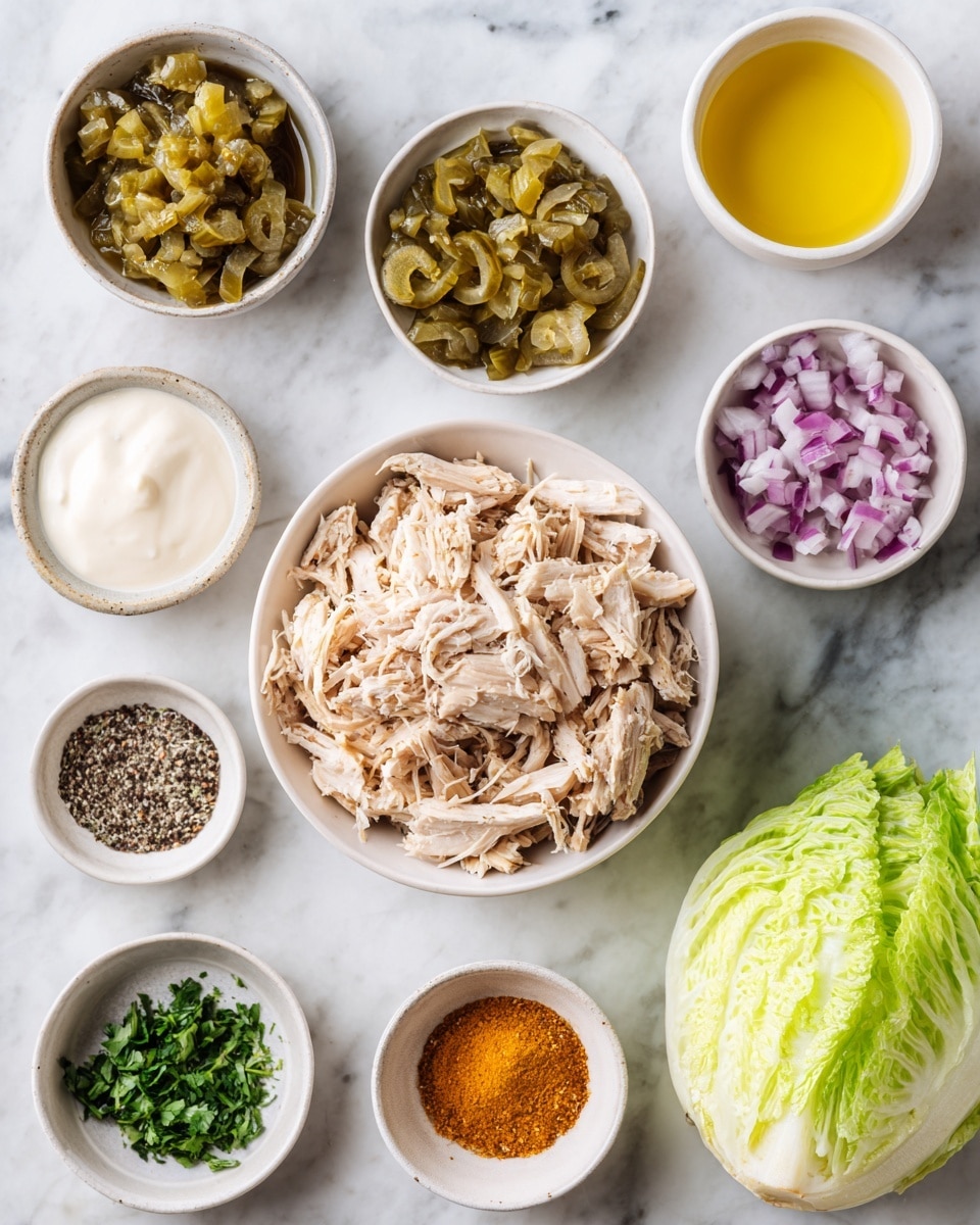 The image shows ingredients for a dish placed on a white marbled surface. In the center, there is a white bowl filled with shredded light brown cooked chicken. Around the chicken, there are smaller white bowls containing different items: green pickles, dark green chopped herbs, diced red onions, olive oil, a thick white creamy sauce, yellow mustard, salt, black pepper, and an orange spice. At the front of the scene, there is a whole green iceberg lettuce. The setup is clean and bright, with natural lighting. Photo taken with an iphone --ar 4:5 --v 7
