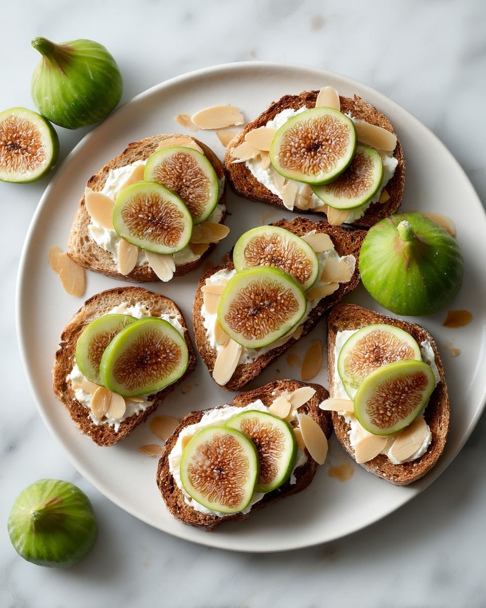 Several pieces of rectangular brown toast are topped with a thick white creamy layer as the base. On top of the cream, there are almond slices scattered around, adding a light beige and smooth texture. Whole and sliced green figs, showing their green skins and soft brown and light pink insides, sit on each toast. In the upper left of the image, a clear glass bowl filled with golden honey and a honey dipper is placed on a white marbled surface. Some whole and halved green figs and loose almond slices are also scattered around the toasts and bowl. photo taken with an iphone --ar 4:5 --v 7