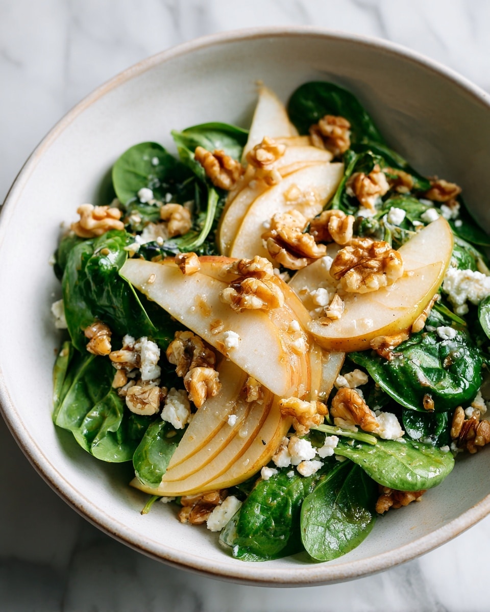 A pink bowl filled with a fresh salad sits on a yellow surface. The salad has many layers: the base is bright green watercress with soft leaves and thin stems, mixed with thin white slices of onion that have a slight curve and translucent texture. Scattered on top are small pieces of light brown pistachios adding crunch. The colors are mostly green and white with little brown spots all over. The background is changed to a white marbled texture. photo taken with an iphone --ar 4:5 --v 7