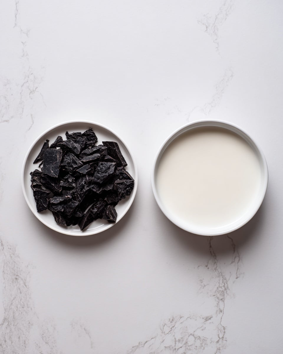 The image shows two small white plates on a white marbled surface. The plate on the left is filled with dark black pieces of dried food that look wrinkled and rough. The plate on the right contains a smooth, creamy white liquid with a shiny surface. Both plates are simple and round, sitting side by side with space between them. photo taken with an iphone --ar 4:5 --v 7