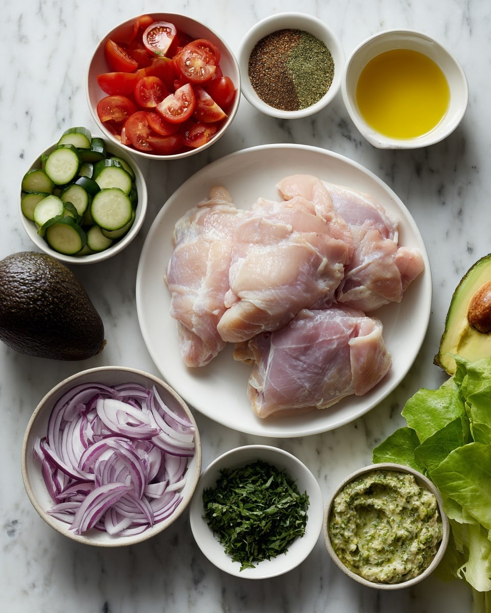 The image shows two raw chicken pieces placed on a white round plate in the center. Around the plate, there are small white bowls with different ingredients: sliced red tomatoes, sliced dark green zucchini, chopped green herbs, a creamy green sauce, thinly sliced purple onions, and a small bowl with a yellow liquid. A whole dark avocado and fresh green romaine lettuce leaves are placed on the white marbled surface around the bowls and plate. A woman's hand is holding one of the bowls filled with spices. The colors are bright and fresh, with a clean layout. Photo taken with an iphone --ar 4:5 --v 7