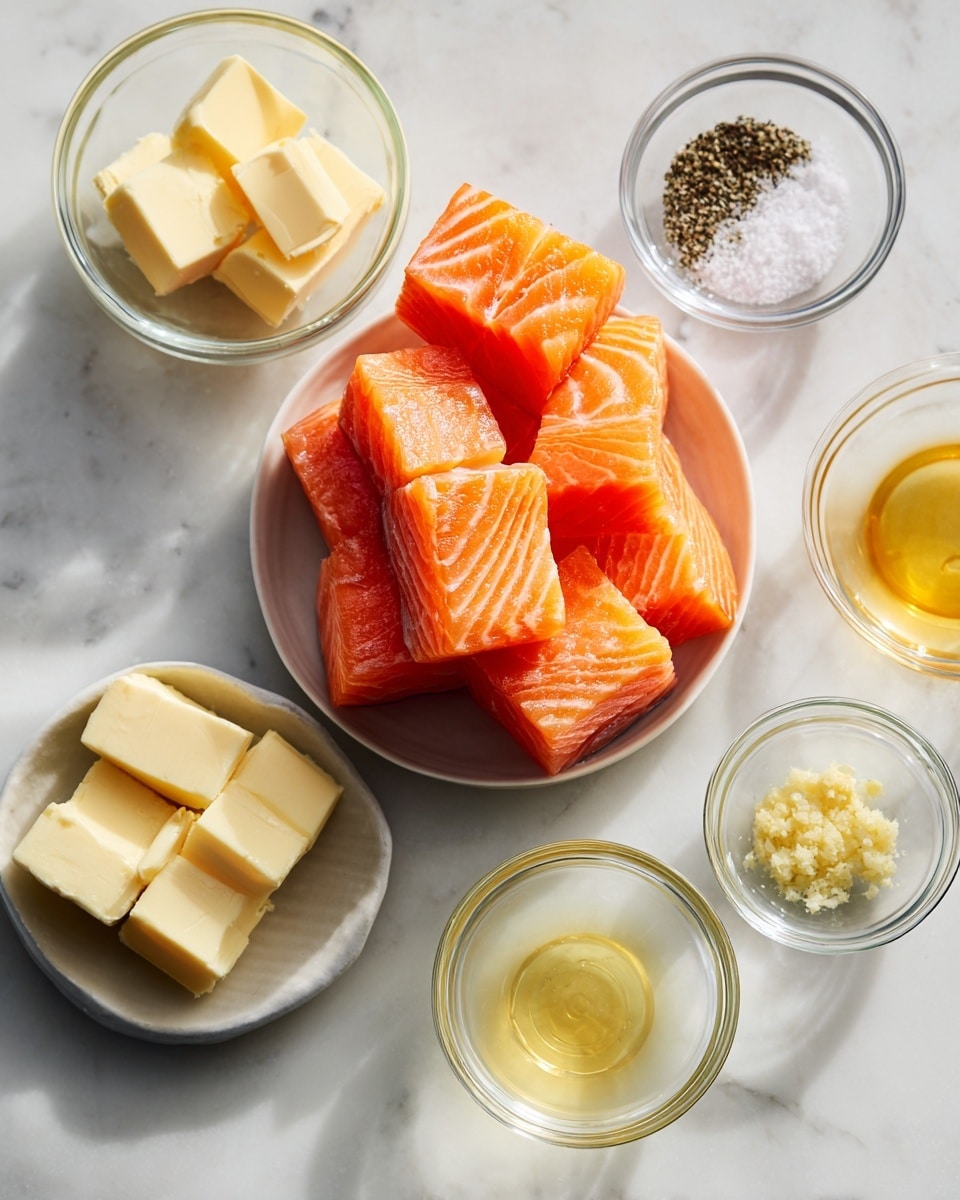 The image shows a white marbled surface with several small clear glass bowls arranged neatly. The center bowl holds thick, bright orange cubes of salmon with white lines running through them, stacked in a small pile. Around it, there are five smaller bowls: one with two pale yellow cubes of butter, one with coarse black pepper, one with coarse salt, one with a light yellow paste that looks like minced garlic, and one with a small amount of a clear, slightly yellow liquid. The scene is clean and bright with soft natural light. photo taken with an iphone --ar 4:5 --v 7