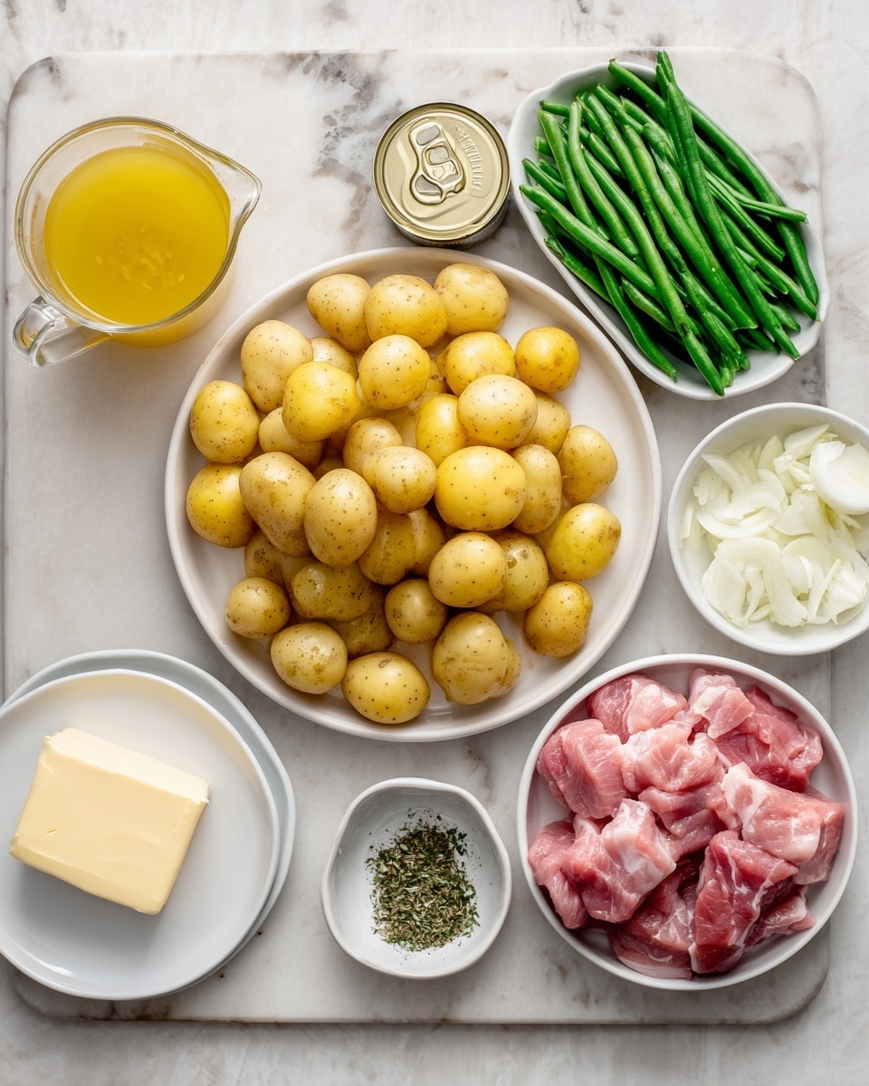 The image shows cooking ingredients arranged neatly on a white marble surface. In the center, there is a white plate filled with small yellow potatoes, some cut in halves. To the right of the potatoes, there is a small pile of chopped white onions beside a small white bowl with minced garlic. Behind these, there are two cans of green beans placed side by side and a clear glass measuring cup filled with a yellow liquid, likely broth. To the front left of the potatoes, there is a white dish holding raw pink pork pieces. In front of everything, there is a white plate with a pat of butter on the left and a small white bowl containing a herb and spice mix on the right. The colors mostly include yellow, white, green, and pink, all set on the white marbled textured surface. Photo taken with an iphone --ar 4:5 --v 7