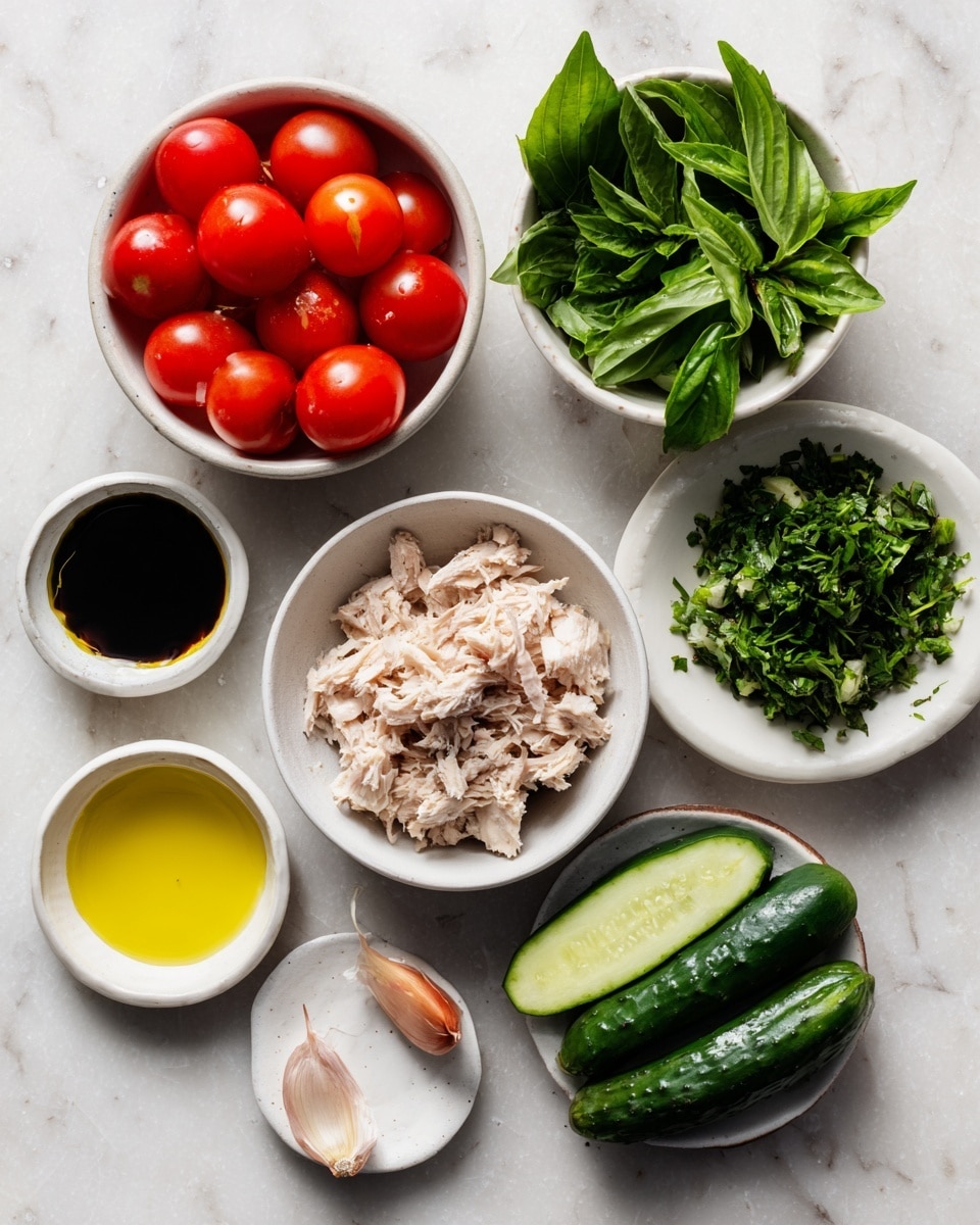 Several small white bowls are arranged on a white marbled surface. One bowl holds bright red cherry tomatoes, another contains fresh green basil leaves, and a third is filled with chopped parsley. There is a bowl with meat flakes in the center, possibly tuna or chicken. Two small bowls hold liquids – one with yellow olive oil and the other with a darker sauce. A white bowl at the bottom has two small cucumbers. A shallot rests on a small white plate near the bowls. The overall colors are vibrant with fresh greens, reds, and natural browns. photo taken with an iphone --ar 4:5 --v 7