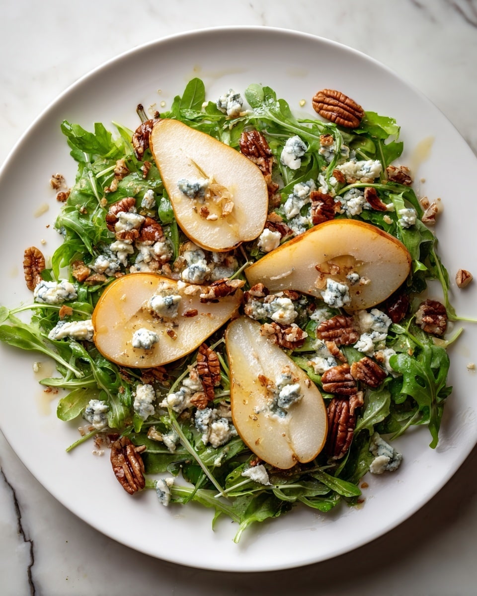 A white plate holds a salad with three layers: the base layer is fresh green arugula leaves spread evenly, the second layer has five golden brown poached pear slices arranged in a circle with their skins showing, and the top layer is made of scattered light brown chopped walnuts and small chunks of blue-veined cheese placed around the pears. The white marbled surface beneath adds a clean, bright look to the image. The pears have a shiny texture, the walnuts are rough, and the cheese looks creamy but firm. photo taken with an iphone --ar 4:5 --v 7