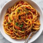 Calabrian Fish Ragu with Spiced Fish and Herb-Garnished Pasta Recipe