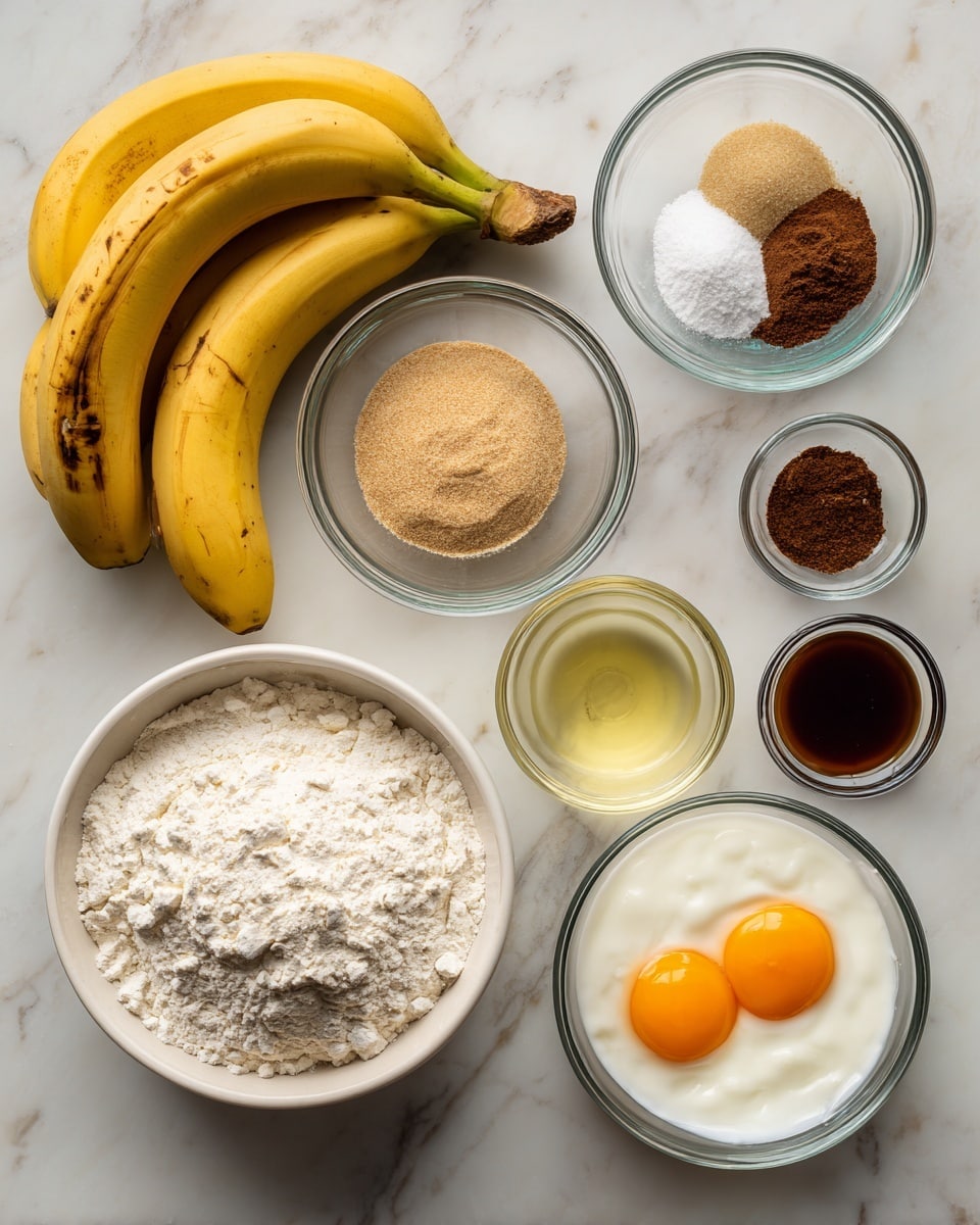 On a white marbled surface, there are seven ingredients arranged neatly. At the top left, there is a bunch of four yellow bananas with some brown spots on their skins. Towards the top right are two small clear glass bowls, one filled with three spice powders—white, light brown, and dark brown—placed close together. Below them is a larger clear glass bowl filled with light brown sugar. In the center, a white bowl is filled with white flour that has a soft, powdery texture and is slightly mounded. Towards the bottom left is a small clear glass bowl with light yellow oil. At the bottom center, there is a clear glass bowl with two cracked raw eggs showing bright orange yolks and transparent whites. To the right of the eggs, a small clear glass bowl holds dark brown vanilla extract. Finally, just above the vanilla is a small clear glass bowl filled with thick white yogurt. Photo taken with an iphone --ar 4:5 --v 7